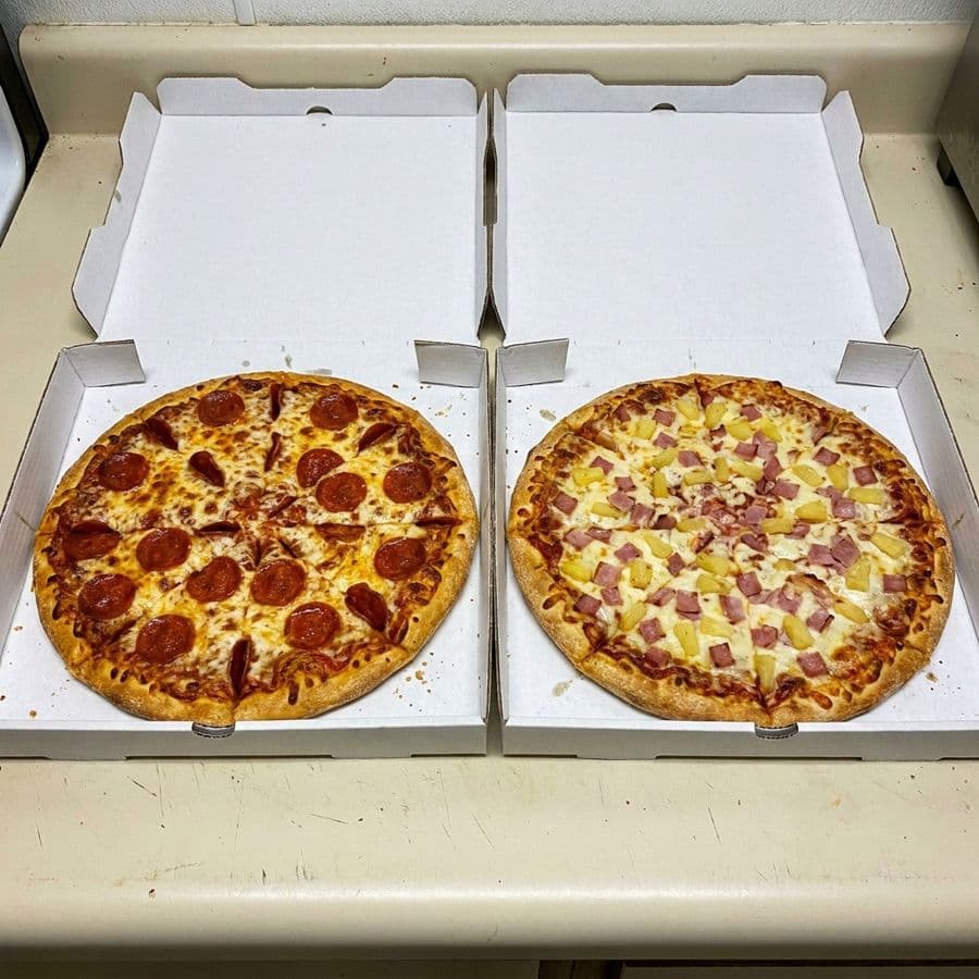 2 Medium Pizzas with 2 Toppings Each